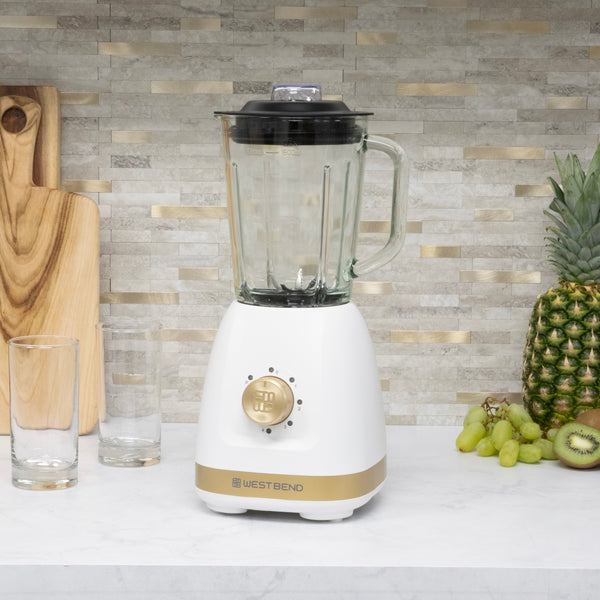 West Bend Timeless 5 Speed Multi-Function Blender, 48 oz Glass Jar, with Travel Cup, in White/Gold- Lifestyle