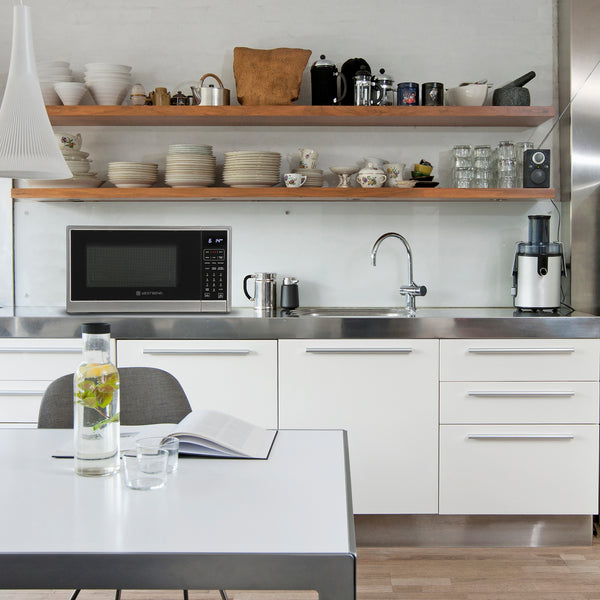 West Bend Microwave Air Fry Convection Oven 3-in-1, 1.3 cu. ft. Capacity, in Black/Stainless Steel- Lifestyle