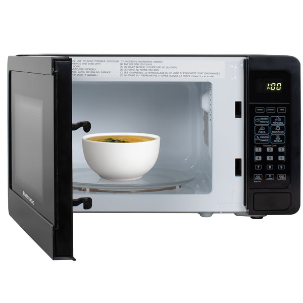 0.7 cu. ft. microwave oven door open with bowl on glass tray