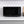 Black microwave oven front view on countertop with control keypad