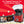 Red air popcorn machine with clear lid and popped popcorn in bowl