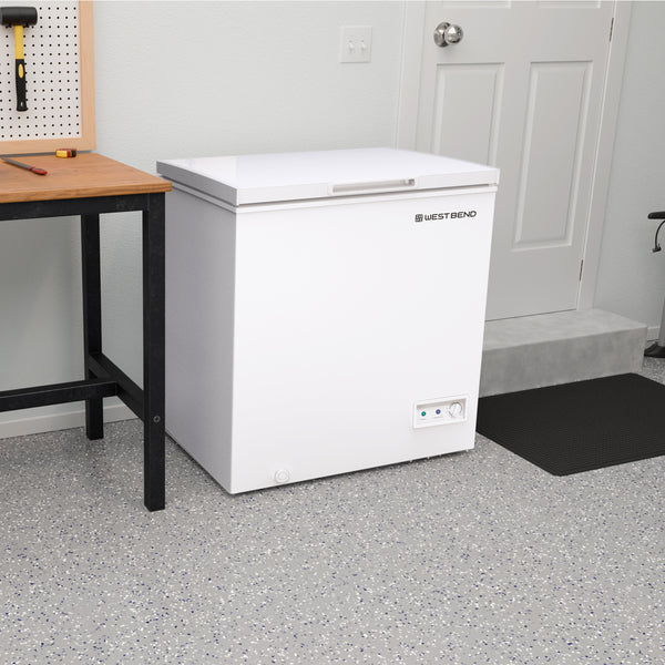 White chest freezer with open lid, WEST BEND logo on front and control panel