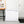 White chest freezer with closed lid and control panel, WEST BEND logo
