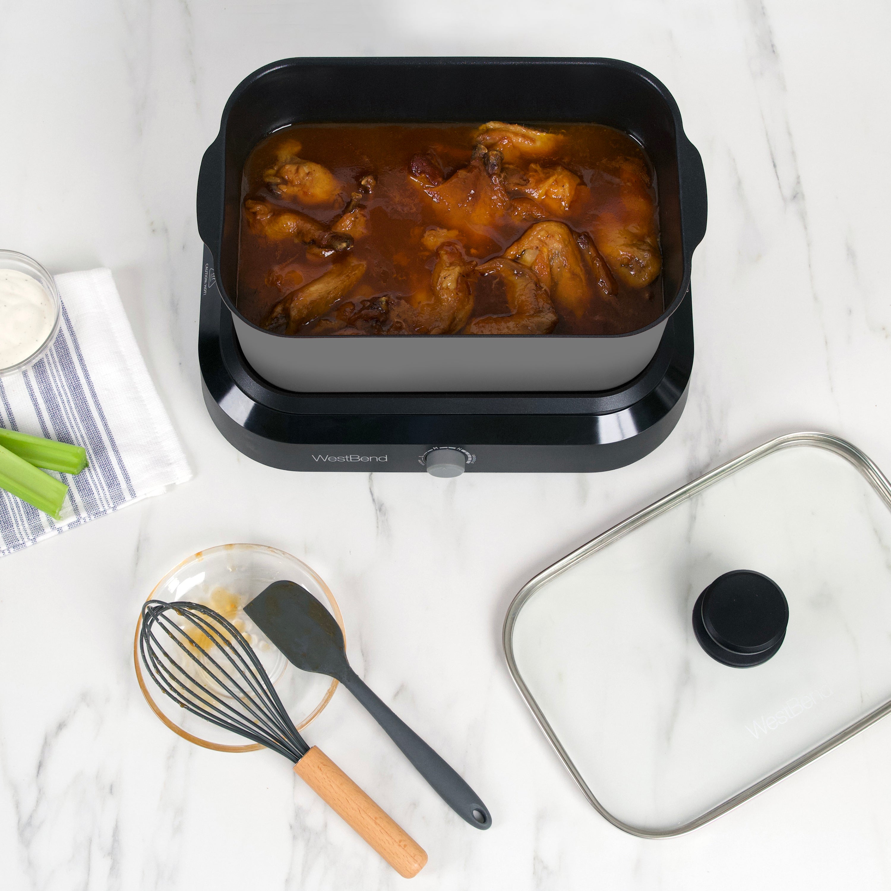West Bend Slow Cooker 6-Qt with Travel Lid, Griddle & Thermal Carrying Case  Only $42.49 (Reg. $70) on