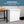 White chest freezer with closed lid and control panel, WEST BEND logo