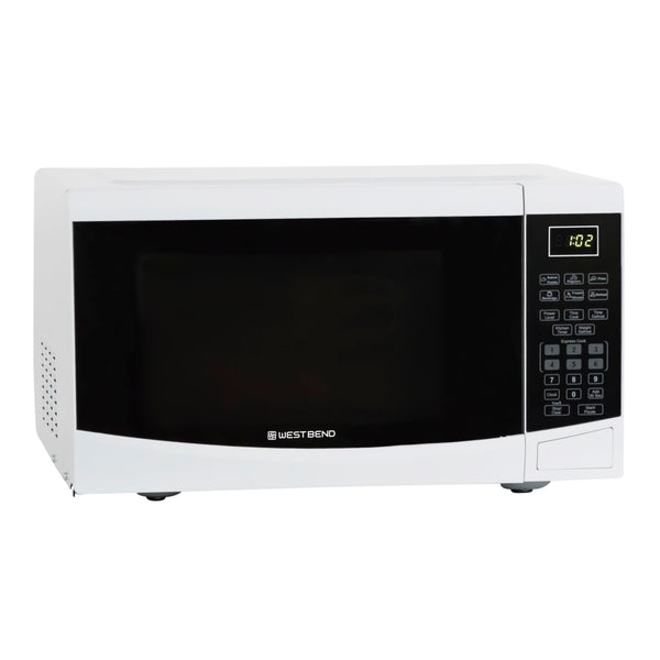 White microwave oven front view with keypad and digital display