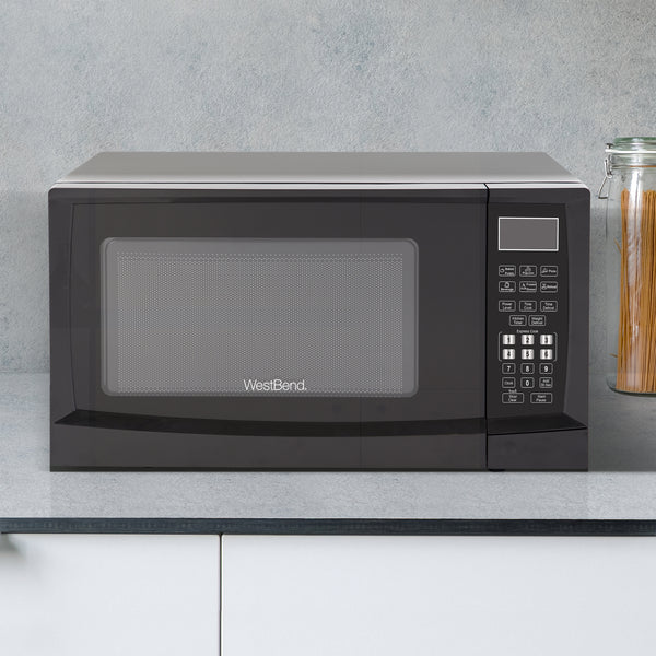 West Bend 0.9 cu. ft. Microwave Oven, in Black- Lifestyle