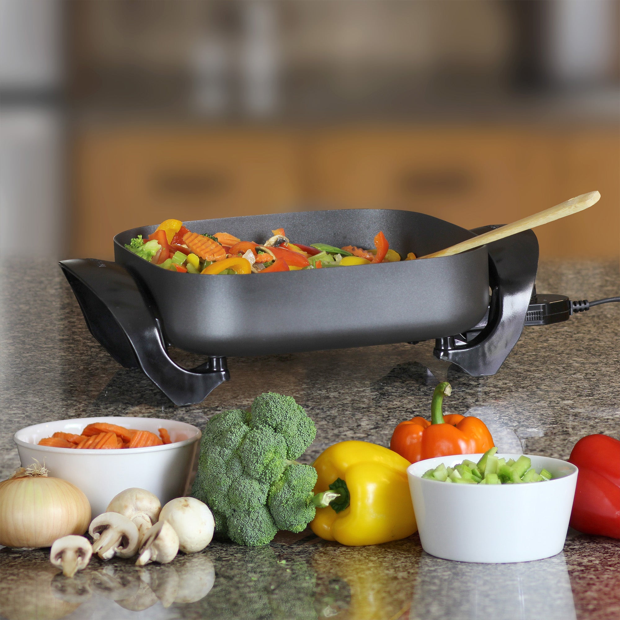 https://westbend.com/cdn/shop/products/west-bend-12-inch-electric-skillet-with-non-stick-coating-skwb12gy13-west-bend-286788.jpg?v=1703745327